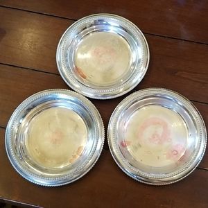 Large Silver Coasters used as candle holders